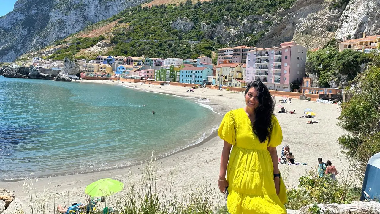 Ruqayyah overlooking a colourful seaside destination